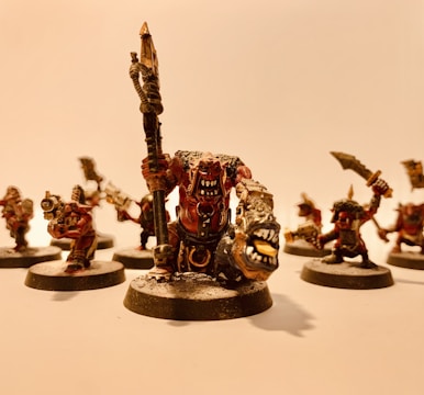 Close-up of intricately painted miniature figures ready for tabletop games.