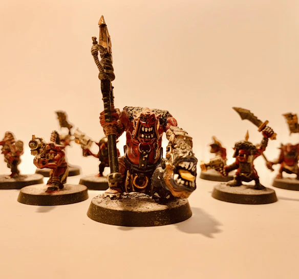 Close-up of a detailed 3D printed miniature figurine with vibrant colors