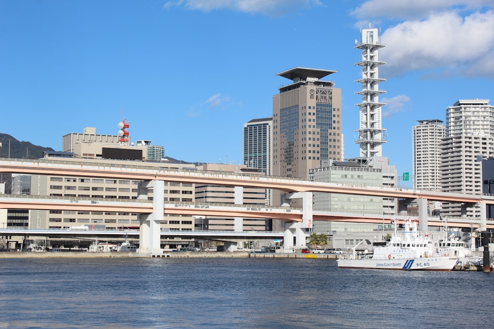 a large body of water with a city in the background