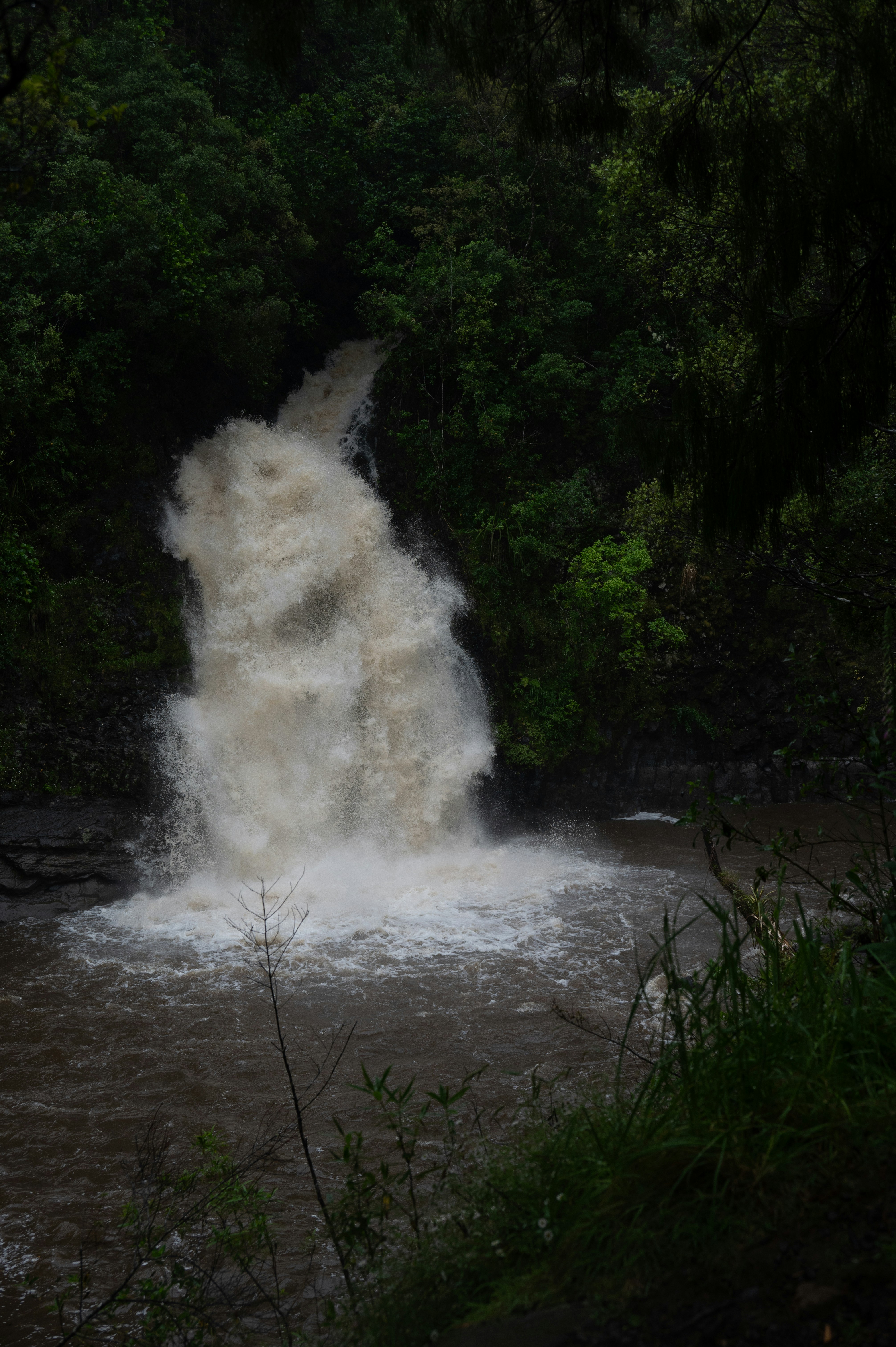 A large waterfall with water coming out of it photo – Free Grey Image ...