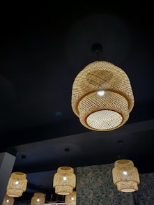 a chandelier hanging from the ceiling in a restaurant