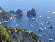 A scenic coastal view with clear blue waters and boats, illustrating the attractive environment for foreign investors.