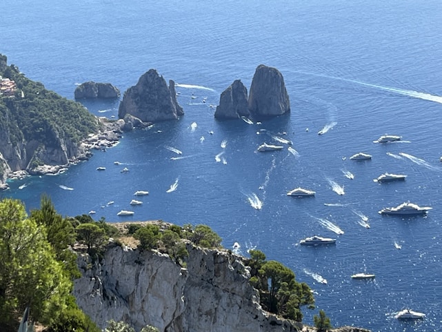 A scenic view of the Alicante coastline with boats.