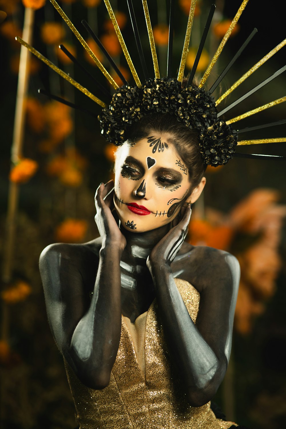 a woman with a skeleton make up on her face