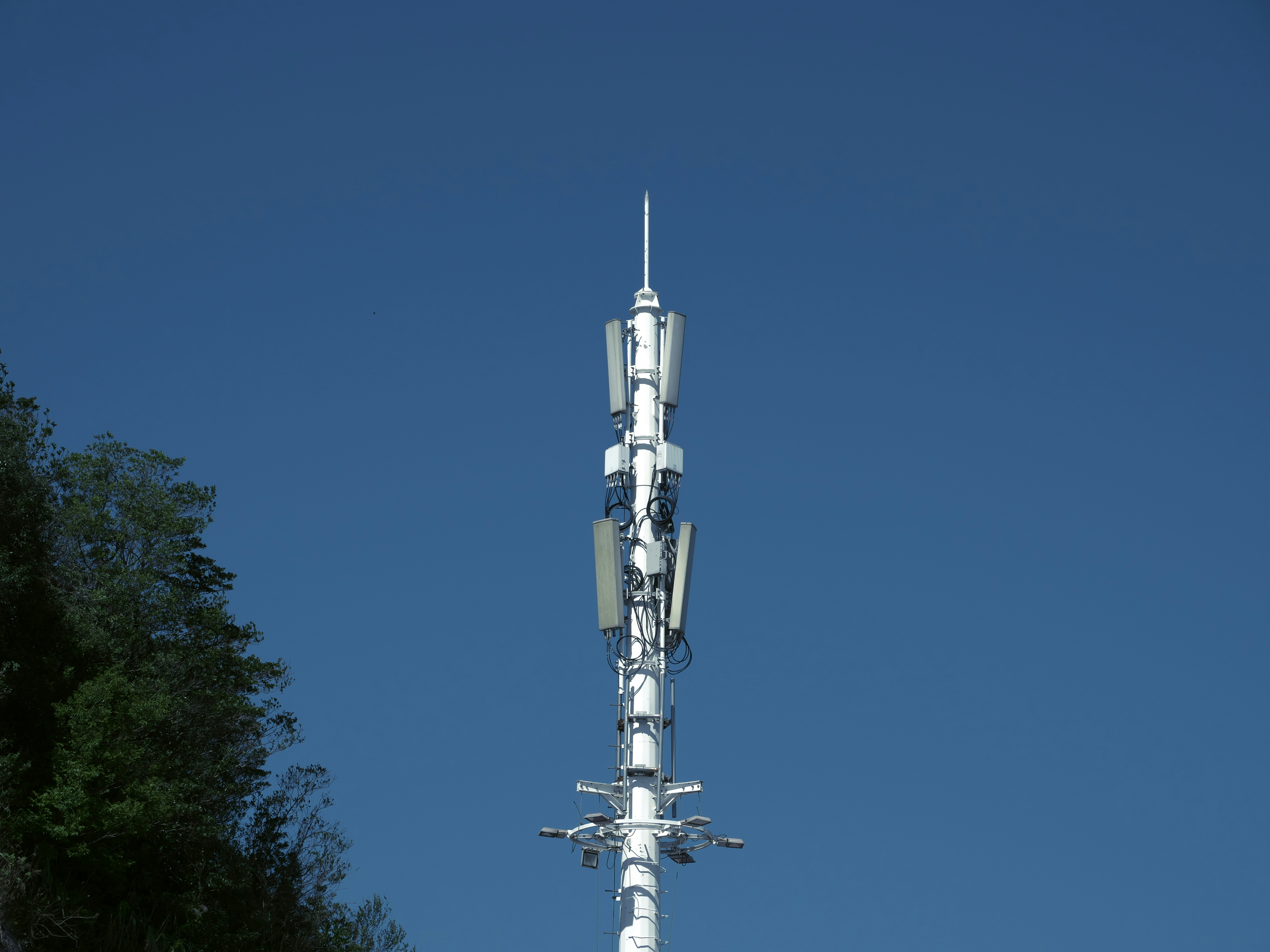 a very tall tower with a bunch of antennas on top of it