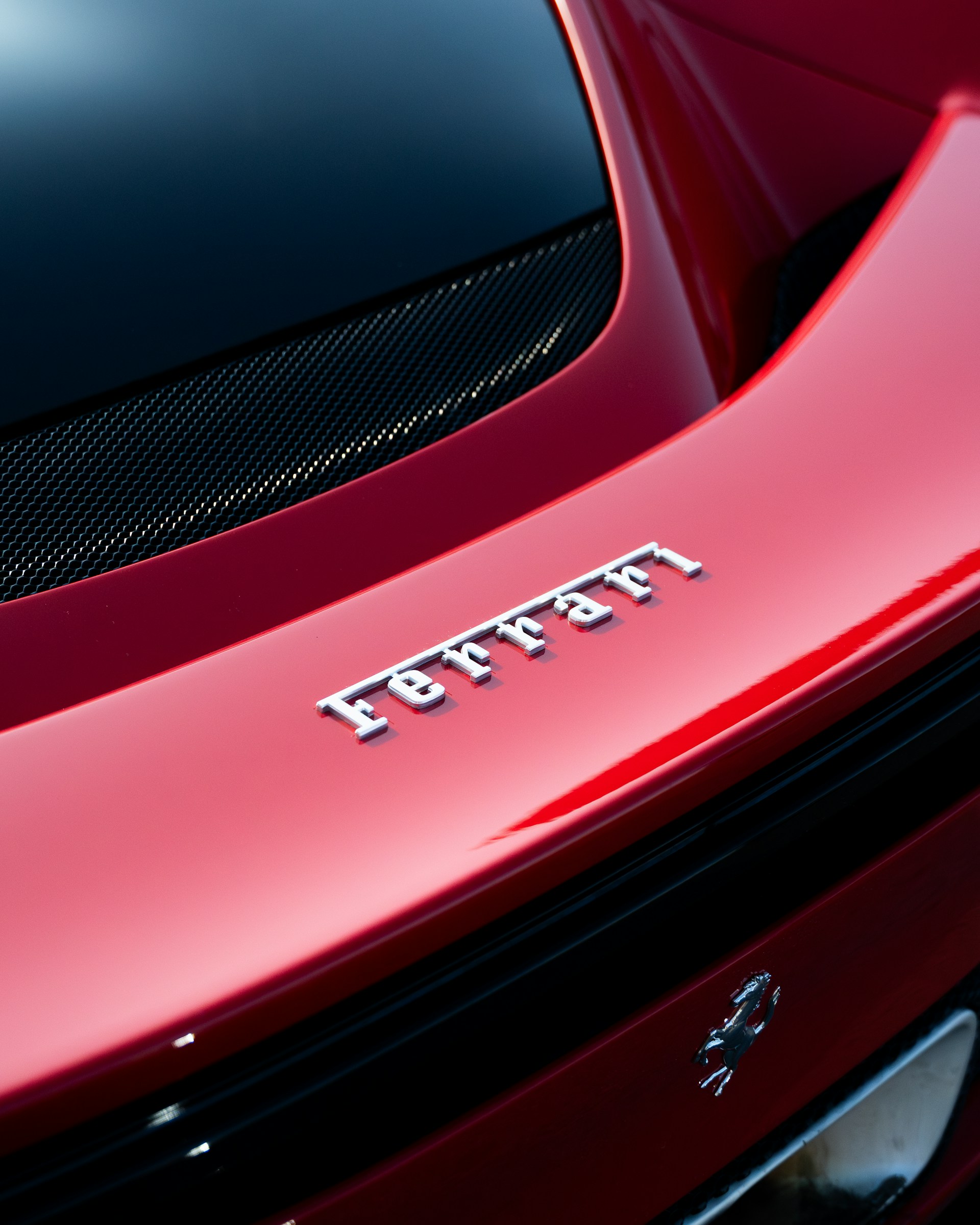 a close up of a red sports car