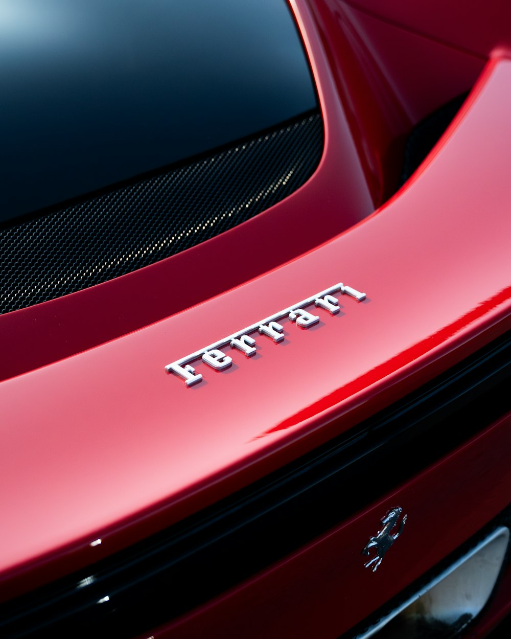 a close up of a red sports car