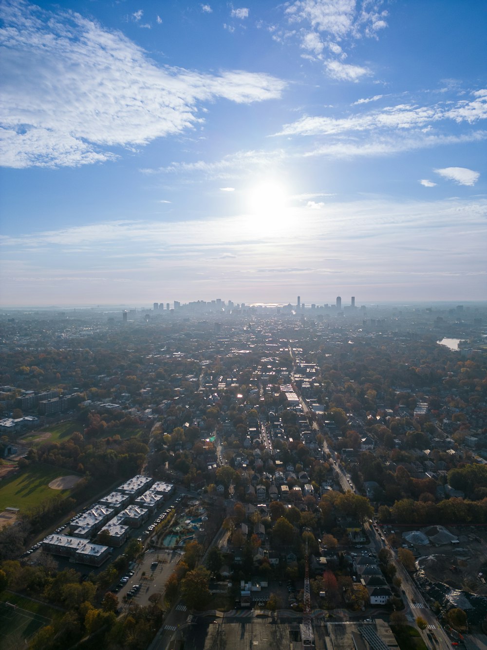 an aerial view of a city with lots of trees