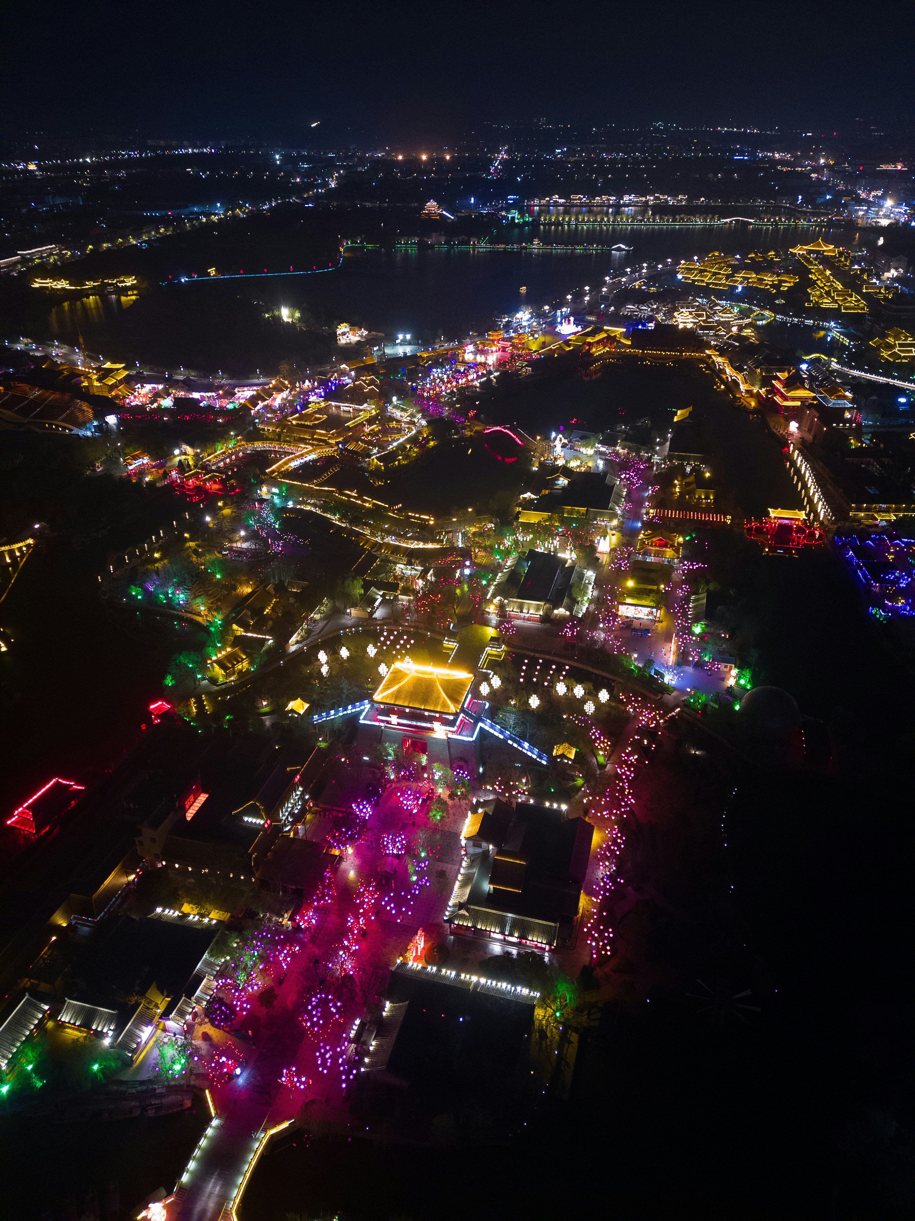 an aerial view of a city at night