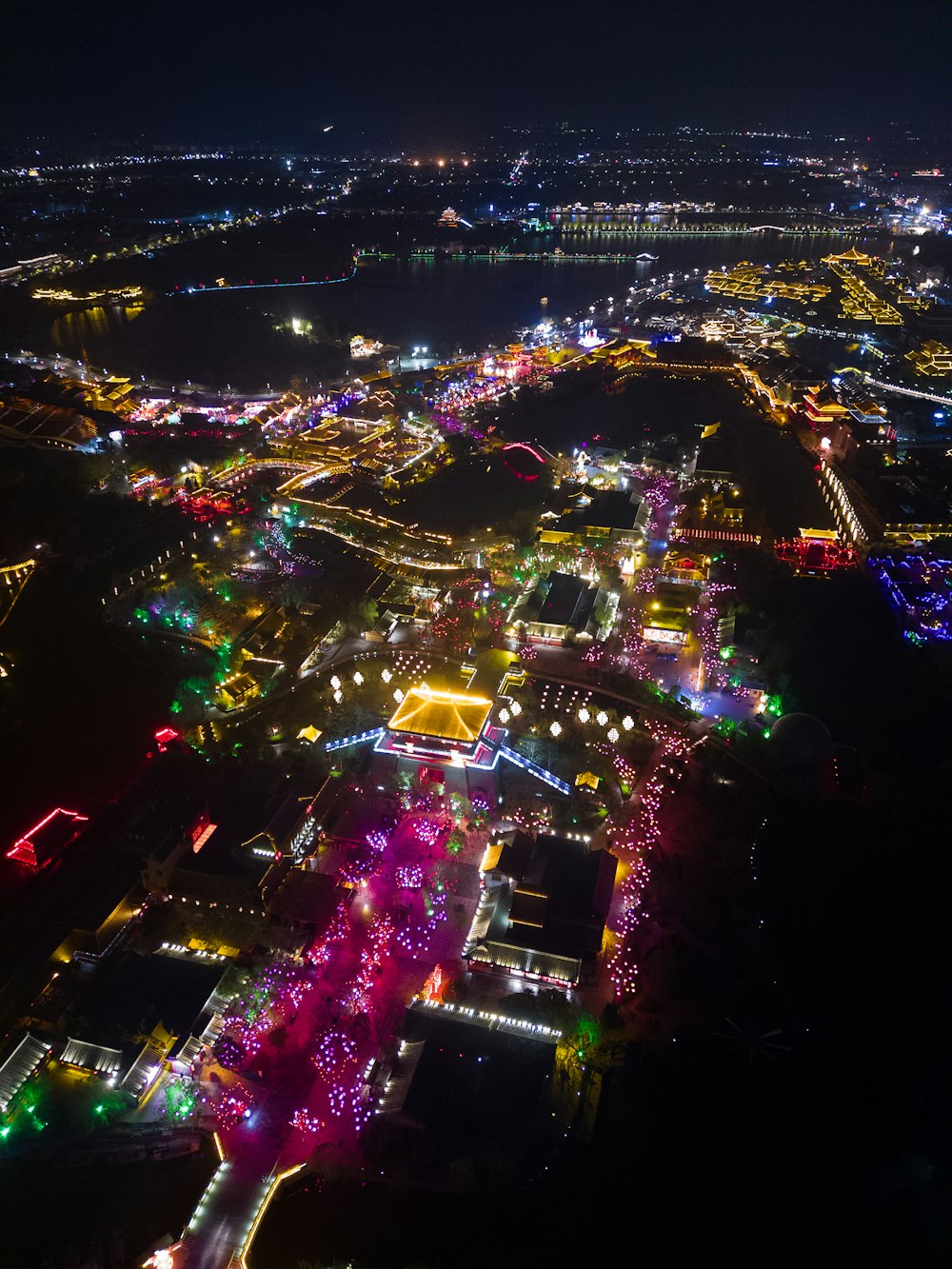 an aerial view of a city at night