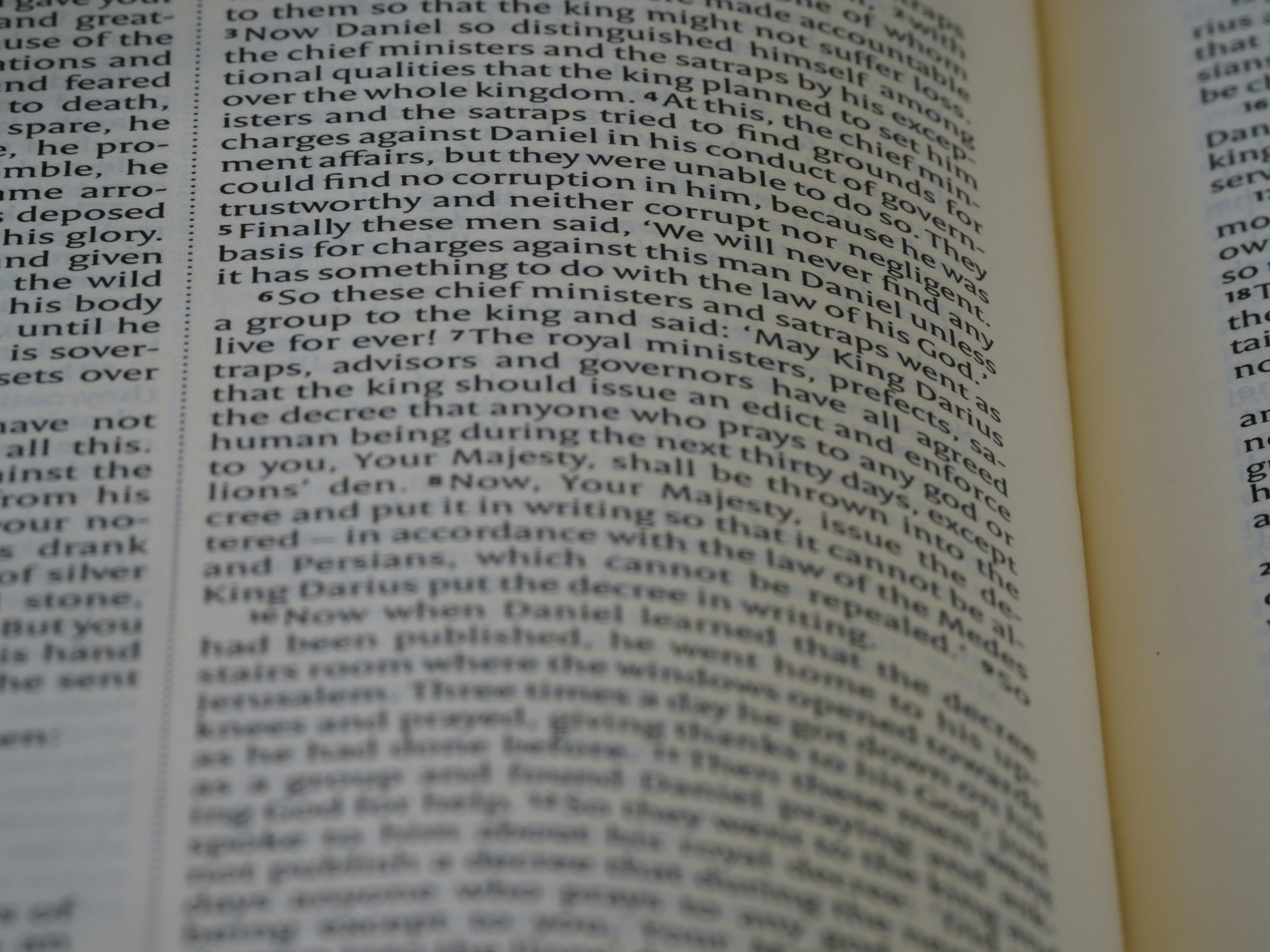 a close up of an open book with words on it