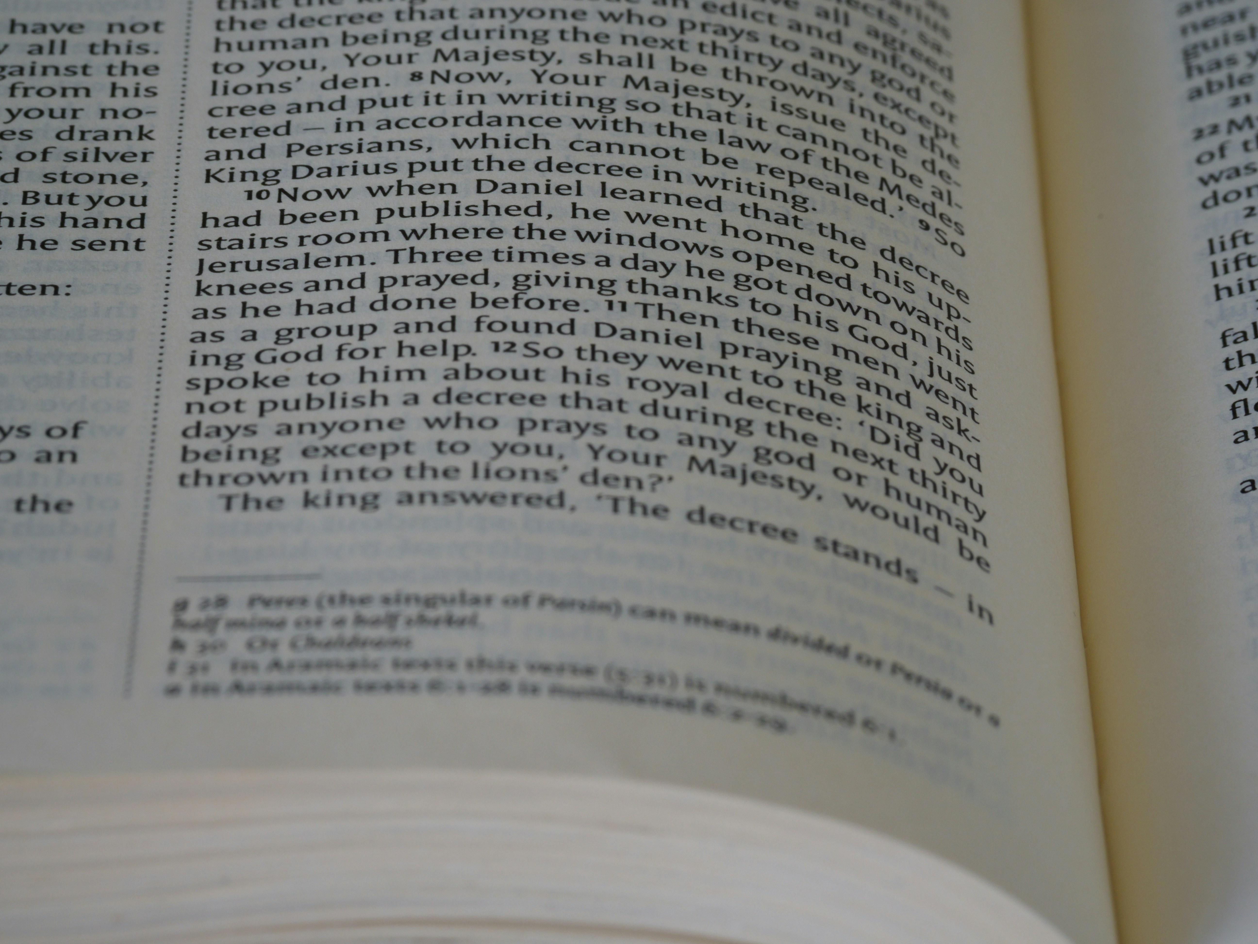 a close up of an open book on a table