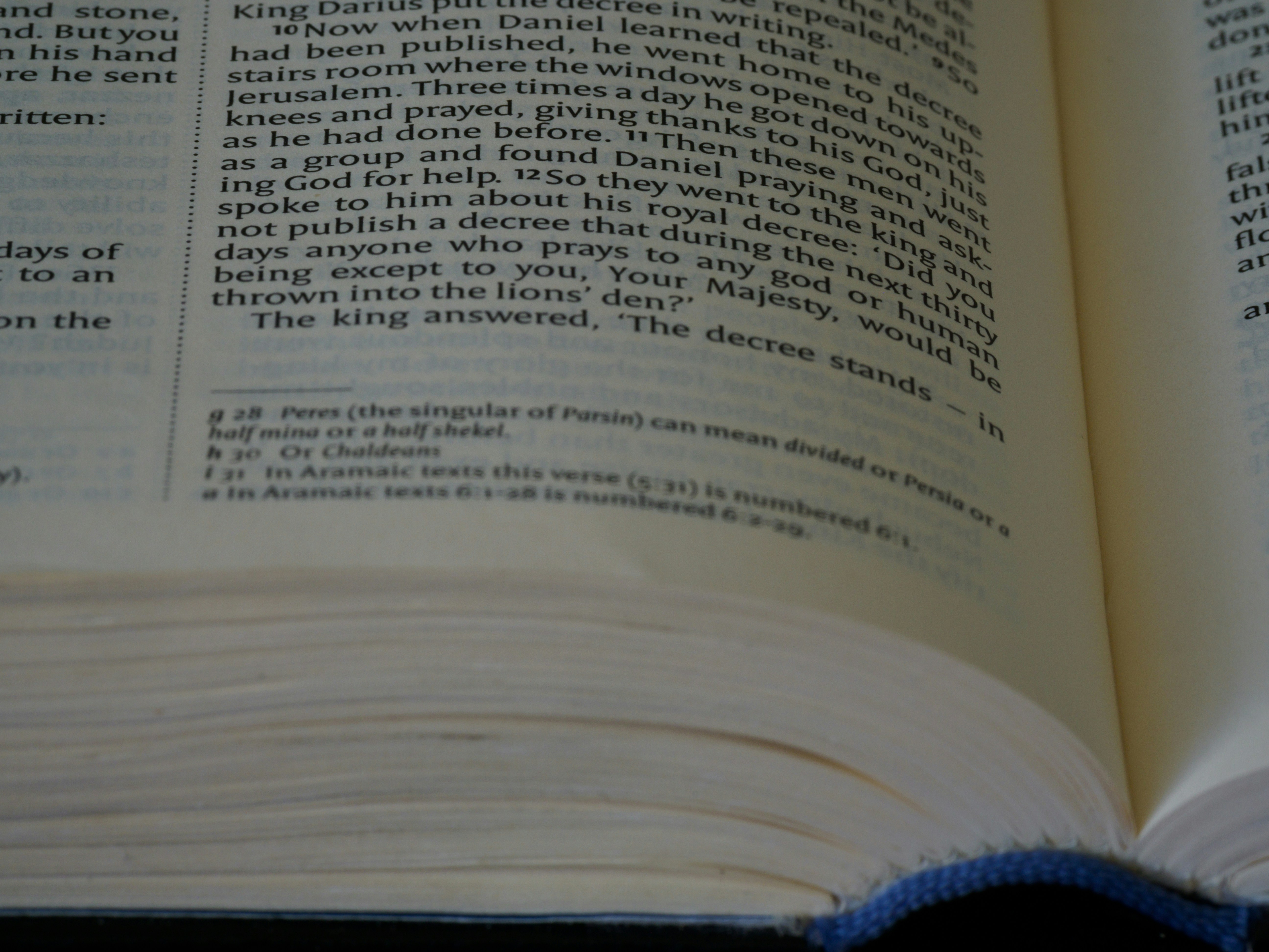 a close up of an open book on a table