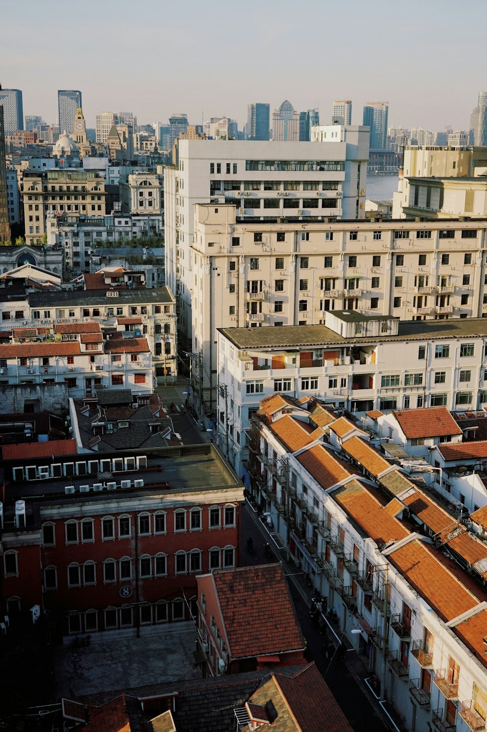 an aerial view of a city with tall buildings