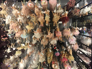 A collection of classical dance accessories such as ankle bells and hair ornaments arranged artistically.
