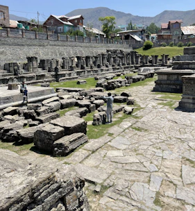 A couple enjoying a private guided tour through an ancient cultural site.