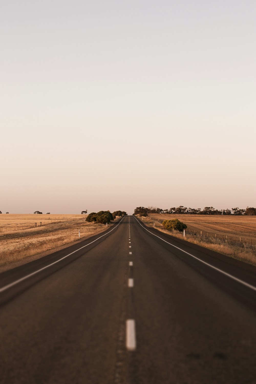 an empty road in the middle of nowhere