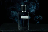A sleek fragrance bottle with a dark, elegant design and a metallic cap. Wisps of smoke swirl around the bottle, enhancing the mysterious and luxurious aesthetic.