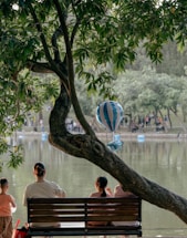 A serene family gathering in a park, symbolizing connection and communication.