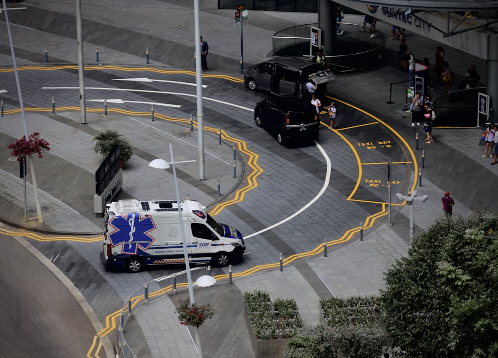 an ambulance is parked on the side of the road