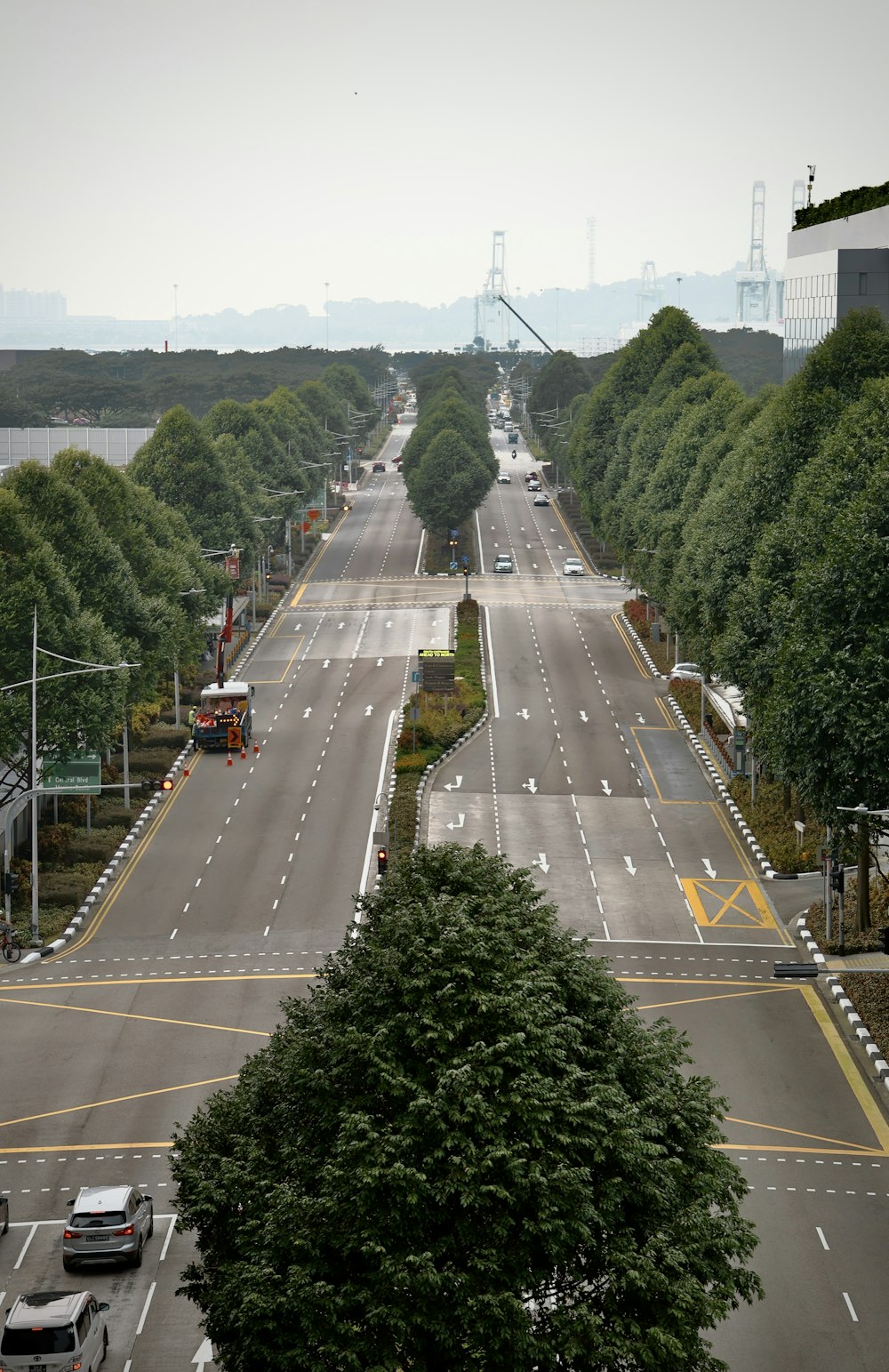 a city street with cars and trucks on it