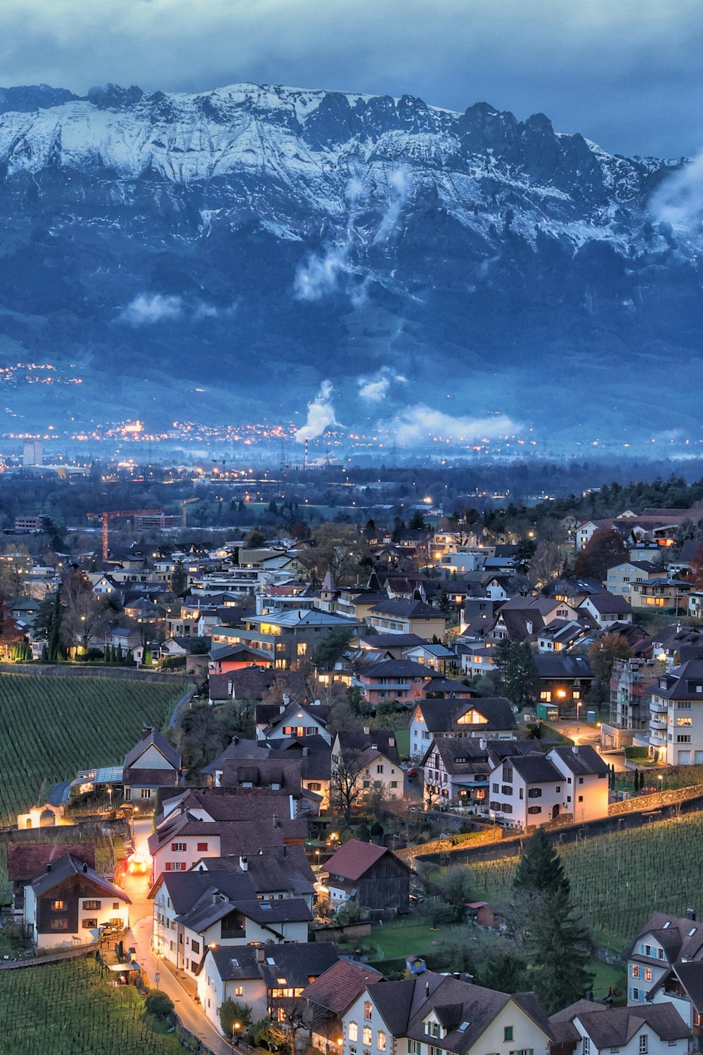 a town with a mountain in the background