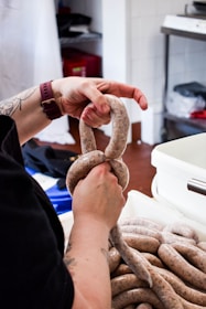 A modern sausage making machine in a factory setting.