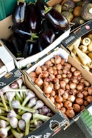 A variety of vegetables displayed at a market.