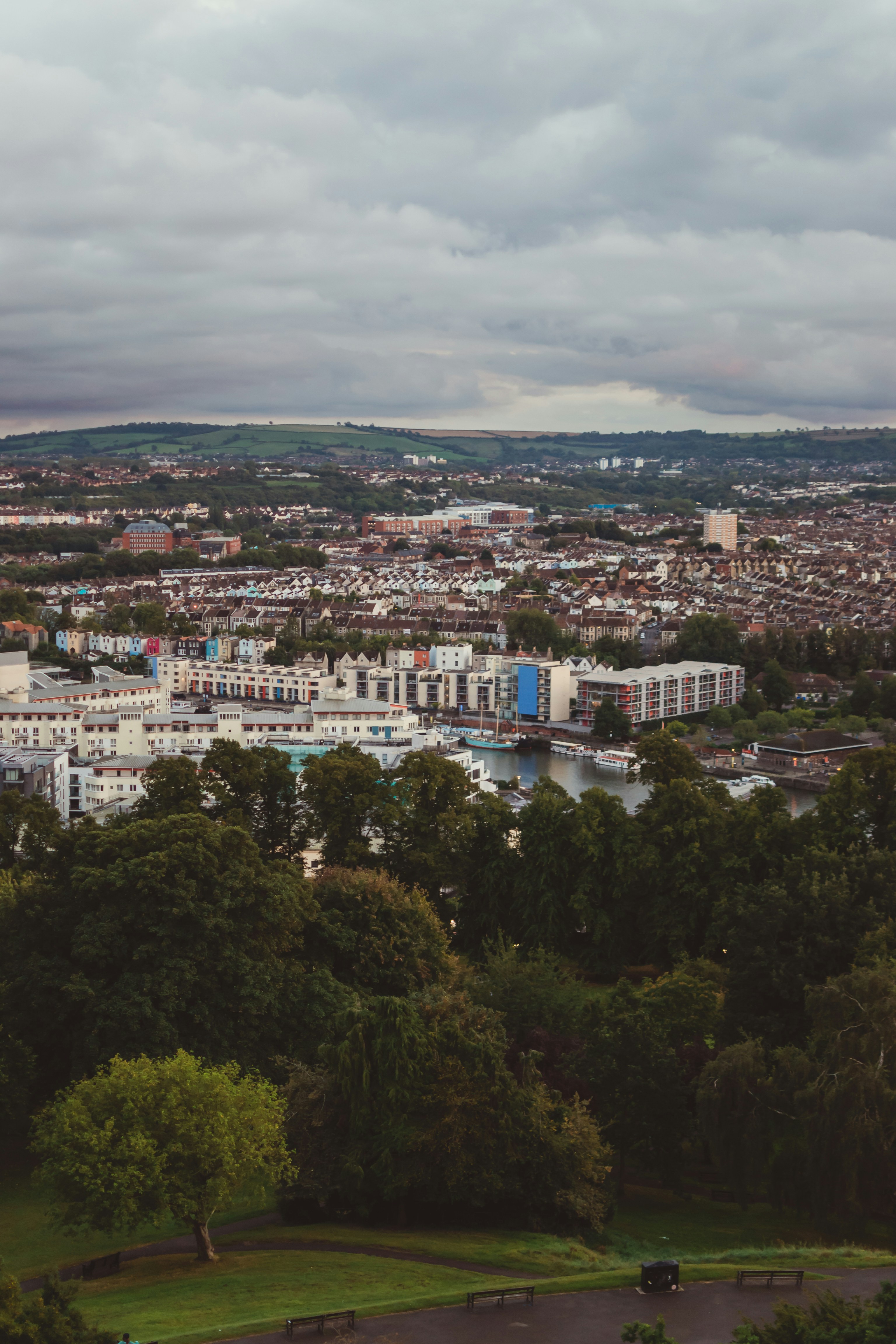 Bristol view from Cabot Tower. United Kingdom in rainy weather with cloudy sky. Autumn vertical wallpaper of Bristol city.