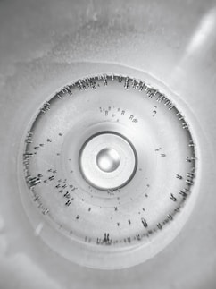a close up of a sink with a circular hole