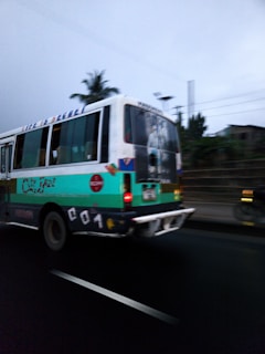 Stayway on a Latin American tour bus, with posters and gear scattered around, capturing the road trip vibe.