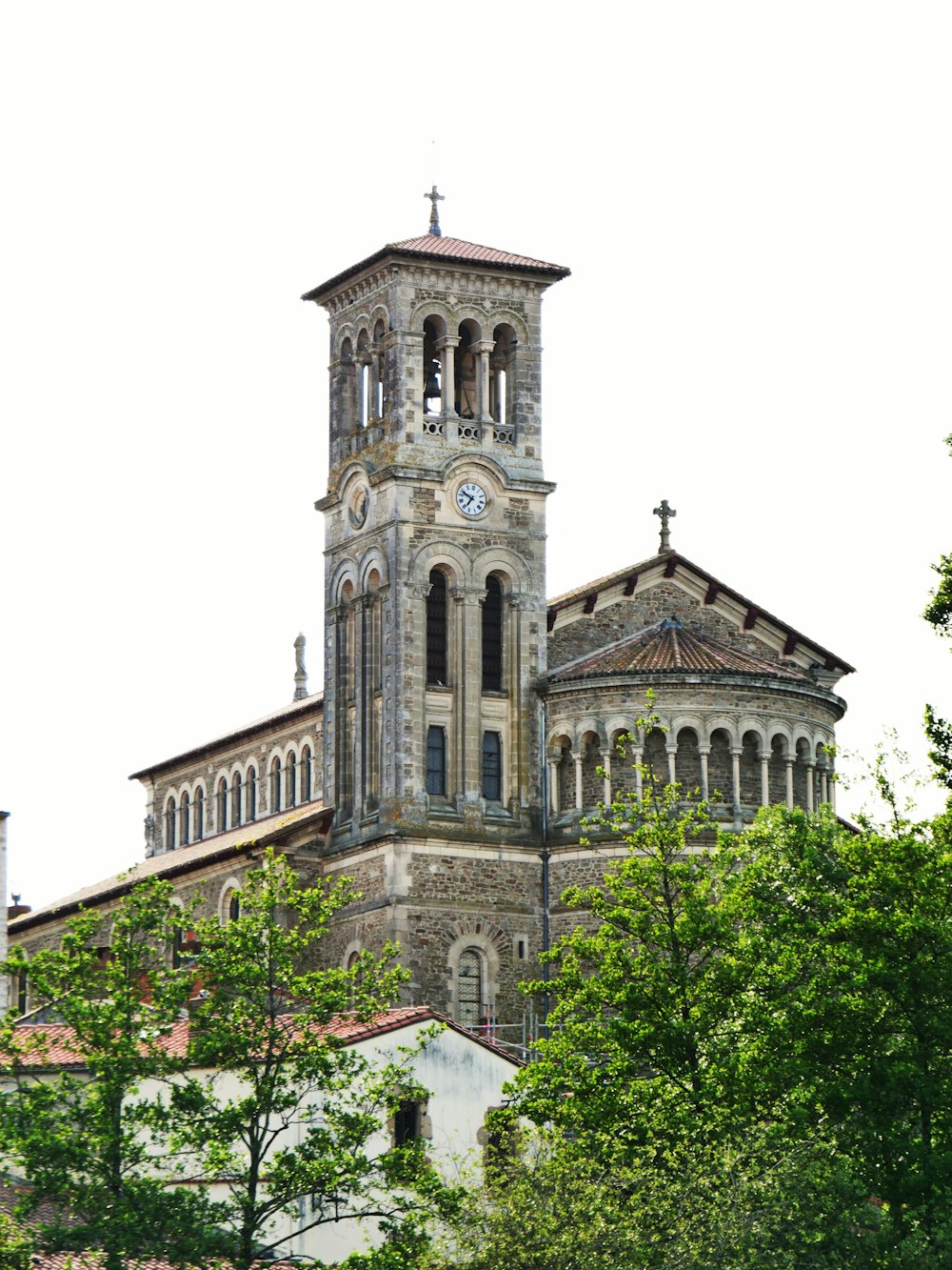 a large building with a clock on the top of it