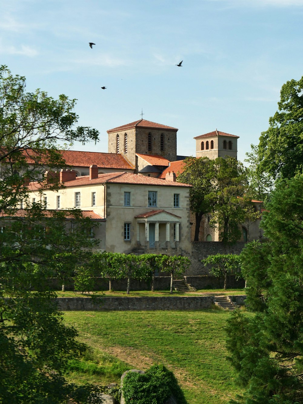 a large building with two towers on top of it