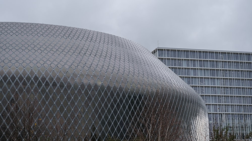 a large building with a large metal structure on top of it