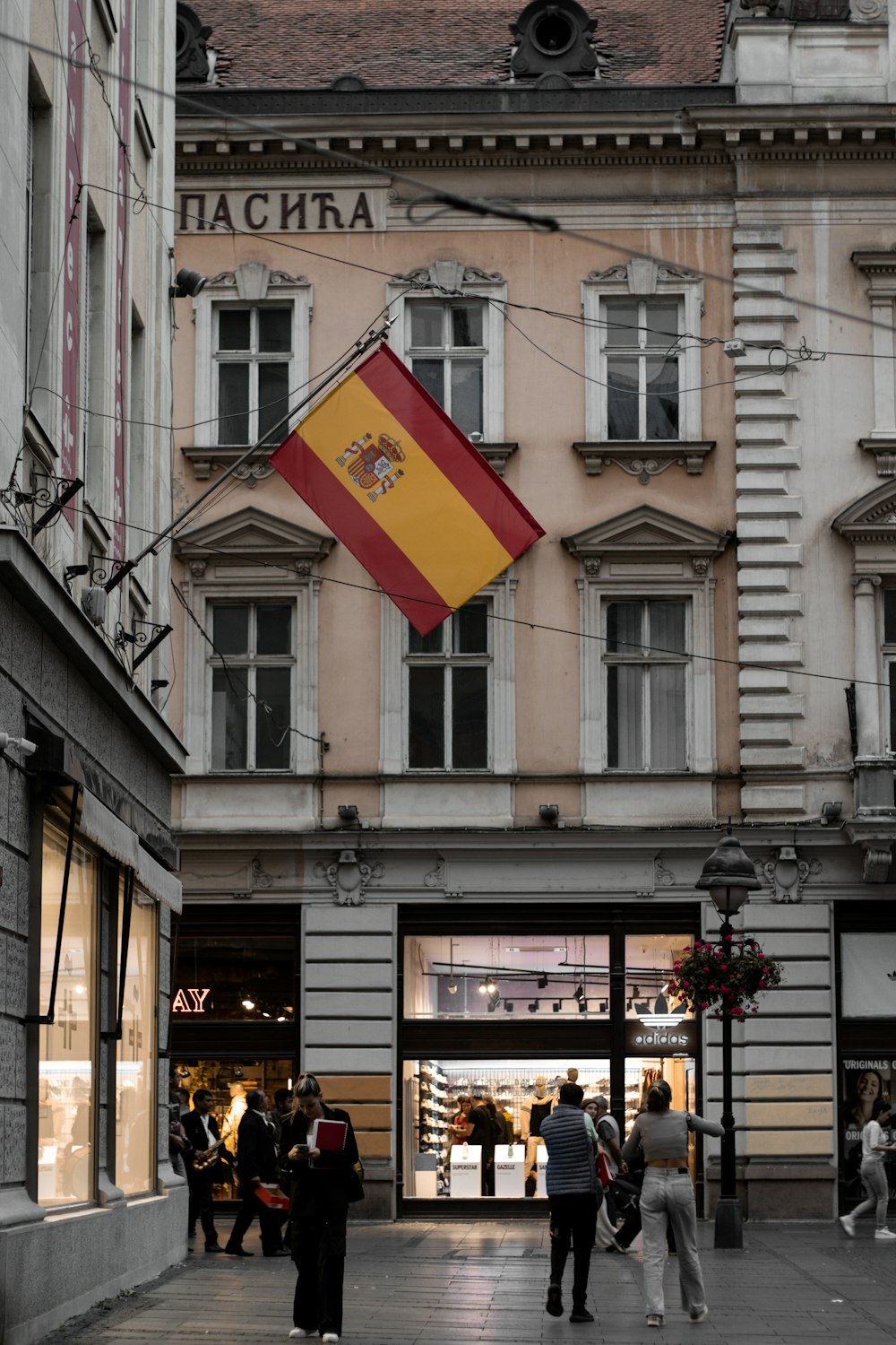 a group of people standing in front of a building