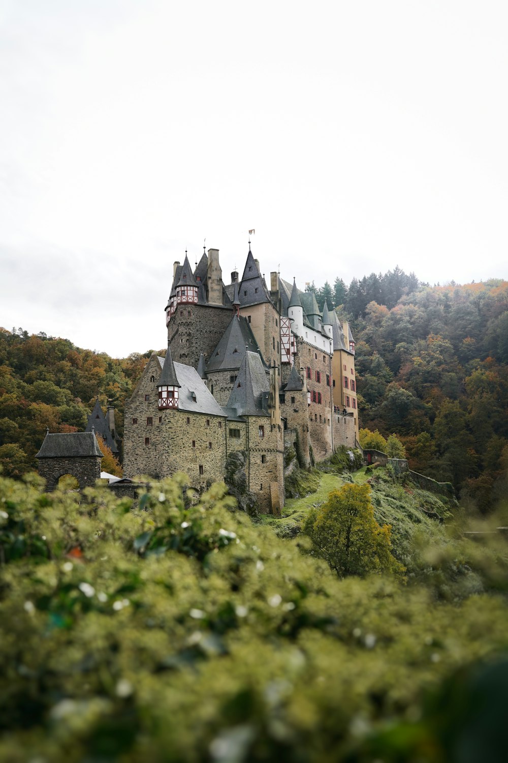 a large castle with a clock on the top of it