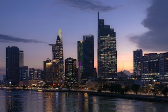 a view of a city at night from across the water