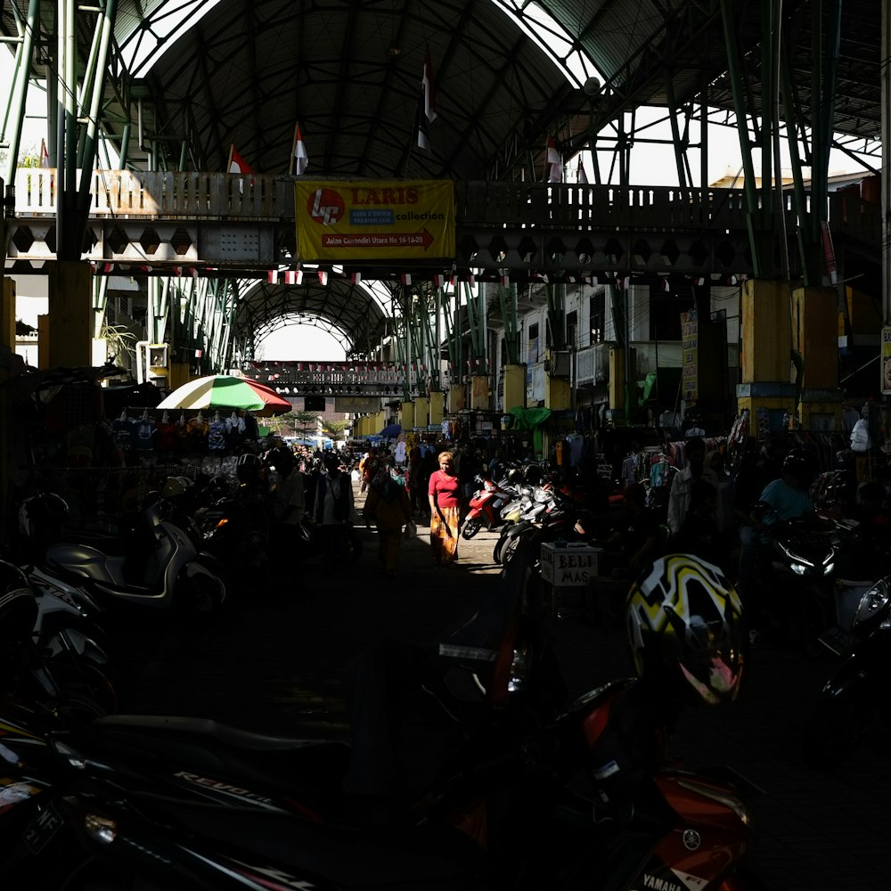 a group of motorcycles parked inside of a building