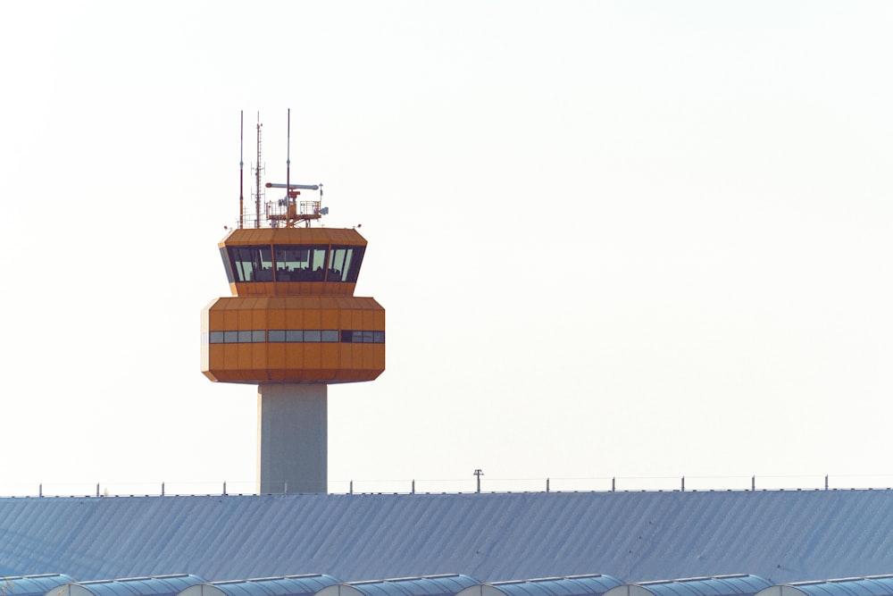 an airplane is sitting on top of a building