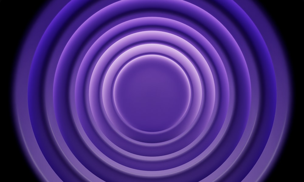 an abstract purple and black background with a circular design