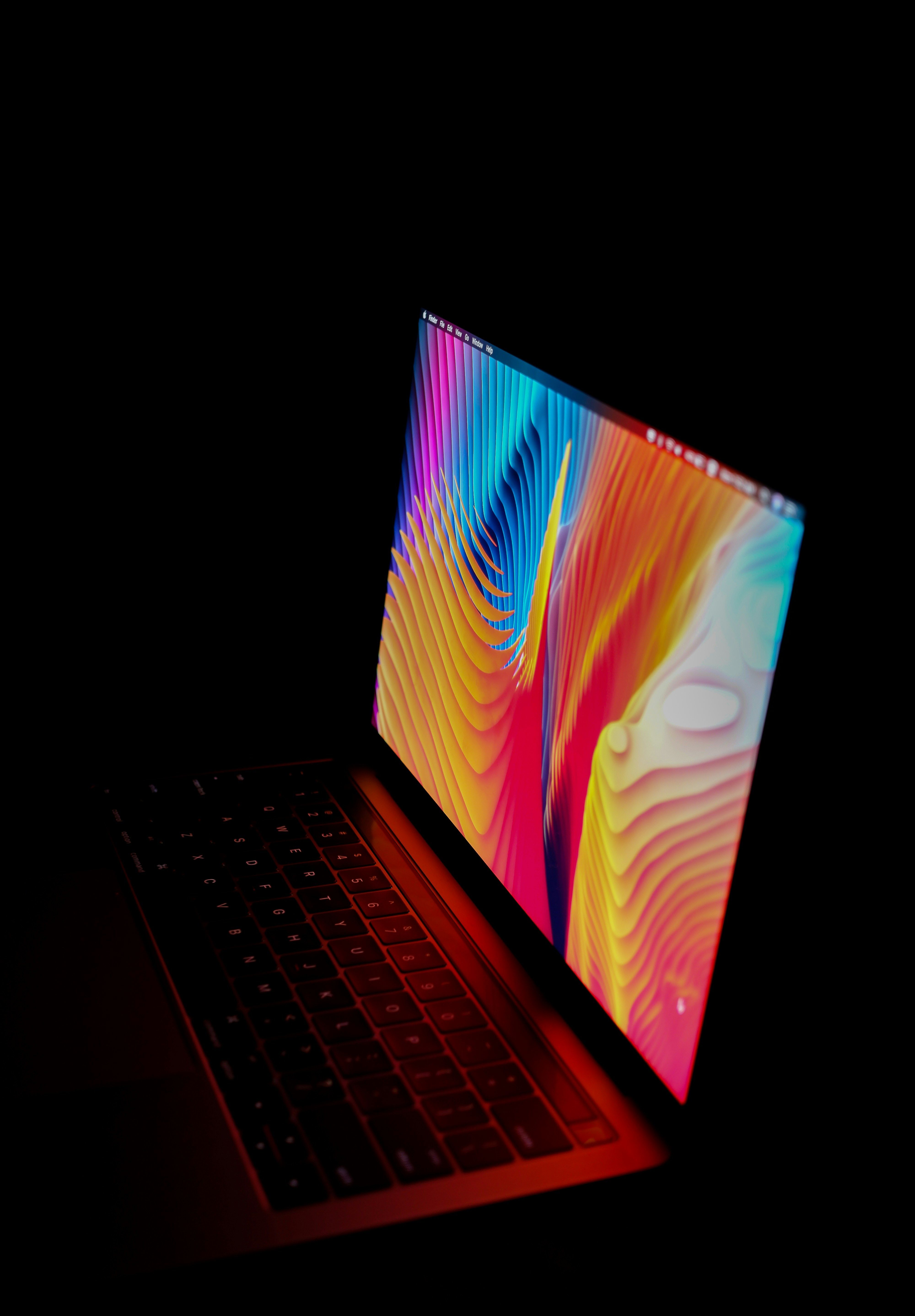 a laptop computer sitting on top of a table