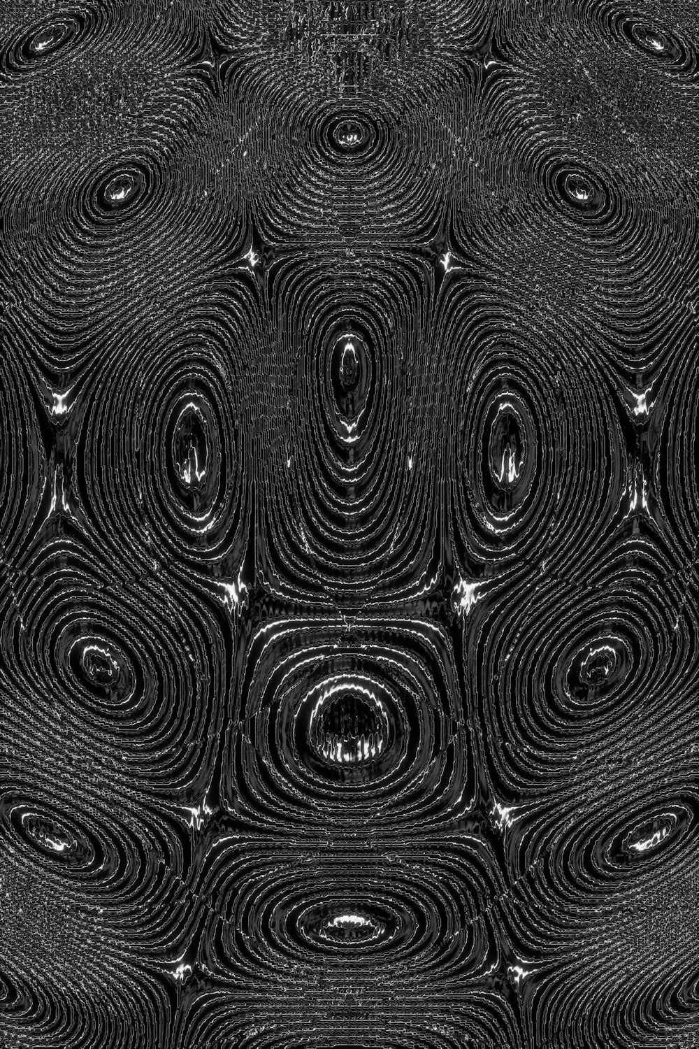 a black and white photo of a pattern