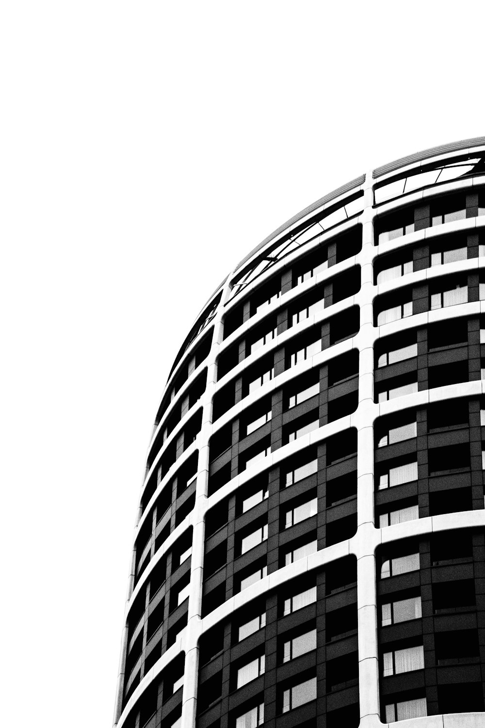 a black and white photo of a tall building