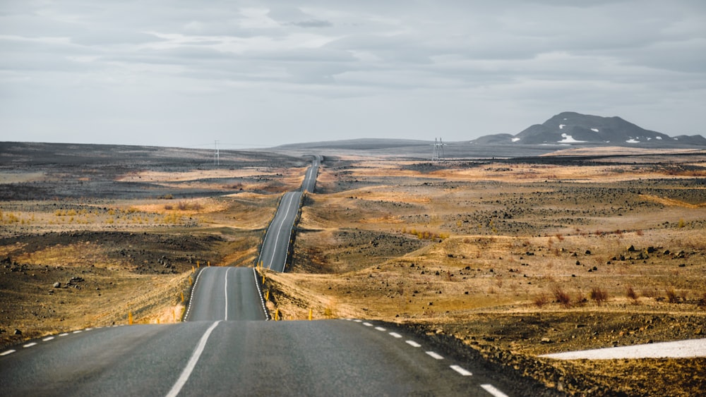 an empty road in the middle of nowhere