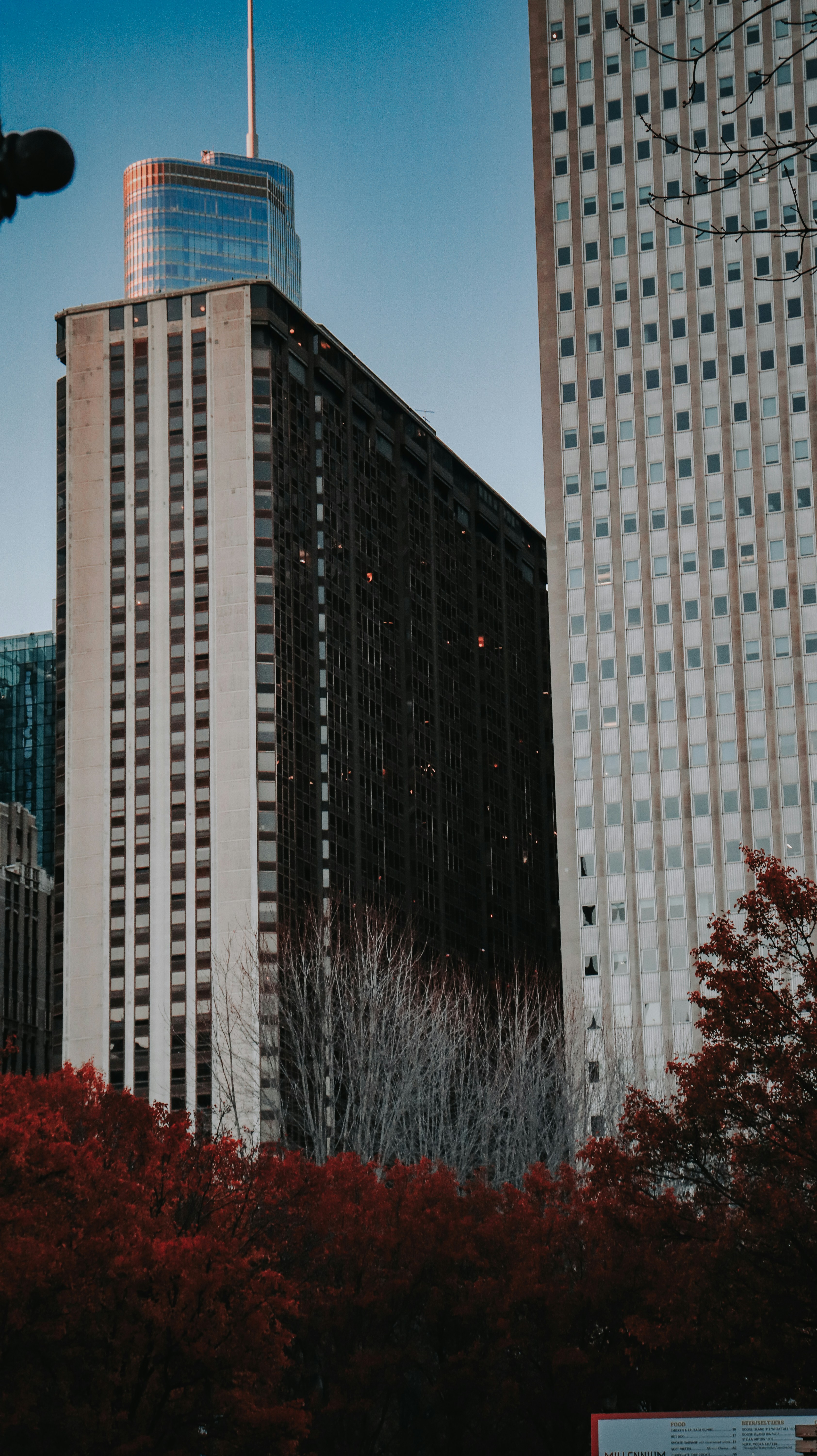 a tall building with a flag on top of it