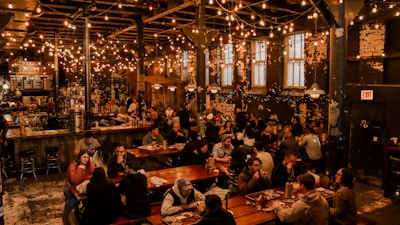 Image of a vibrant multi-branch F&B brand event with customers engaging and enjoying.