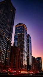 a very tall building in the middle of a city