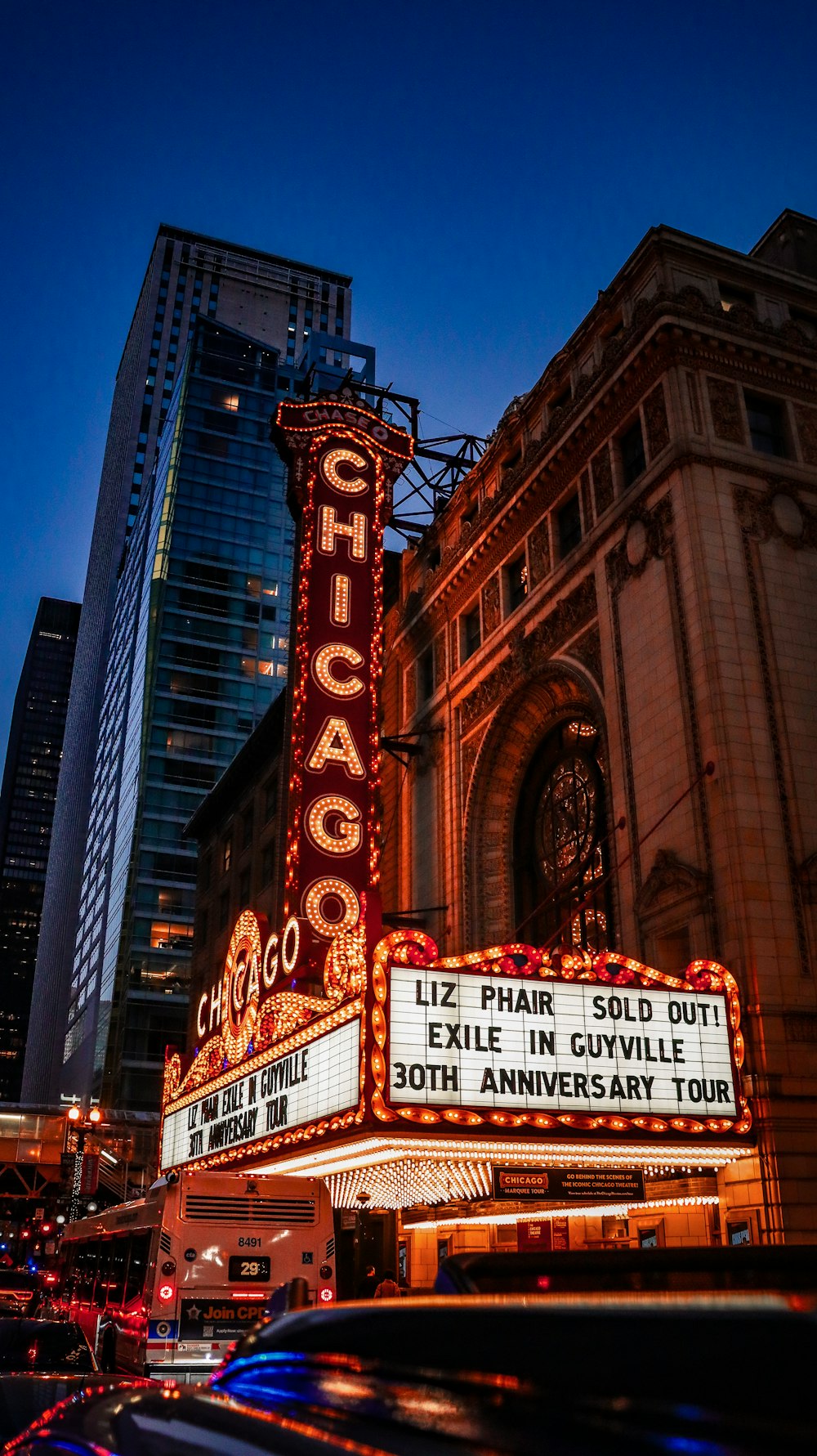 the chicago theater marquee is lit up at night