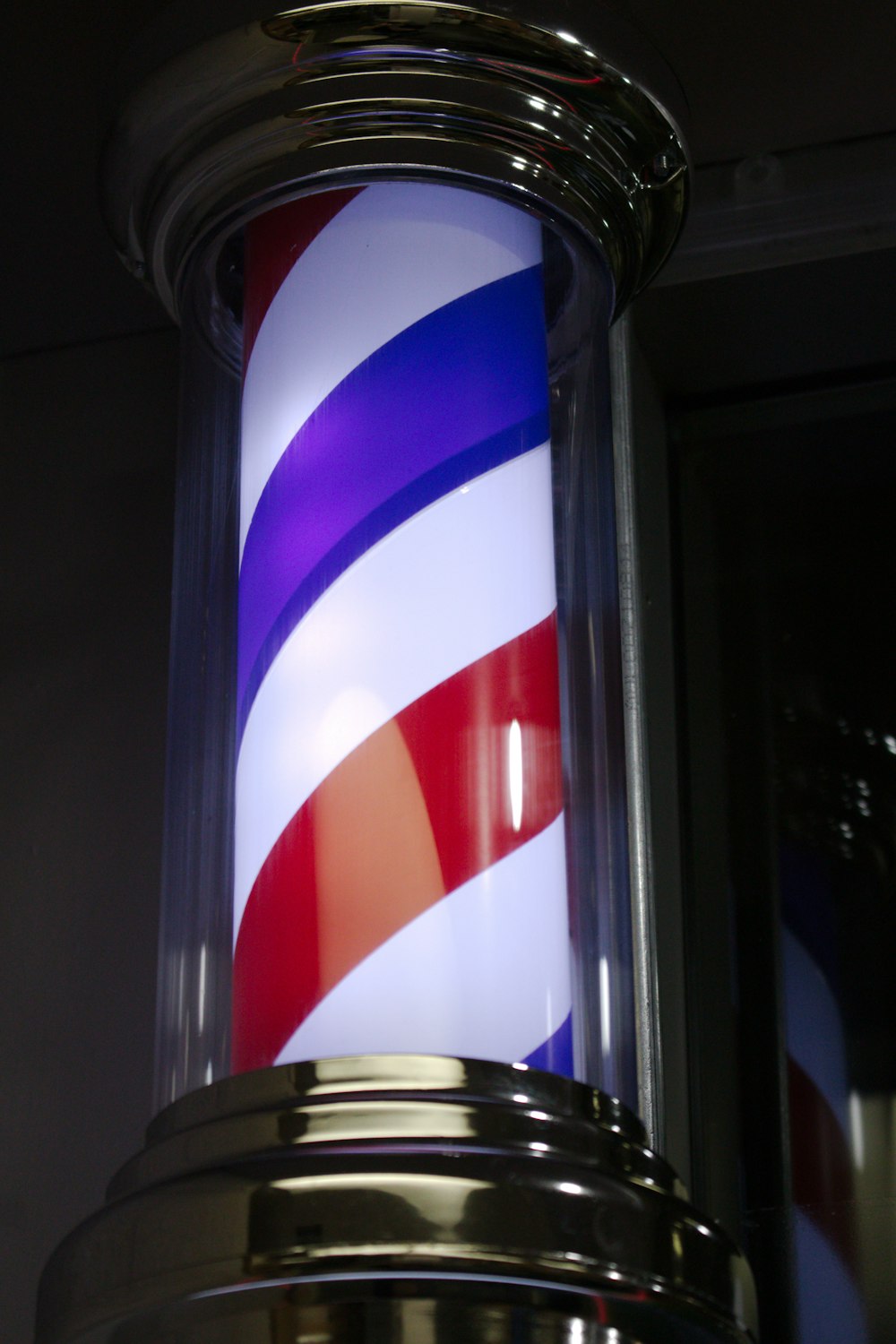 a red, white and blue striped light fixture