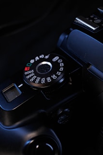 a close up of a camera on a black background